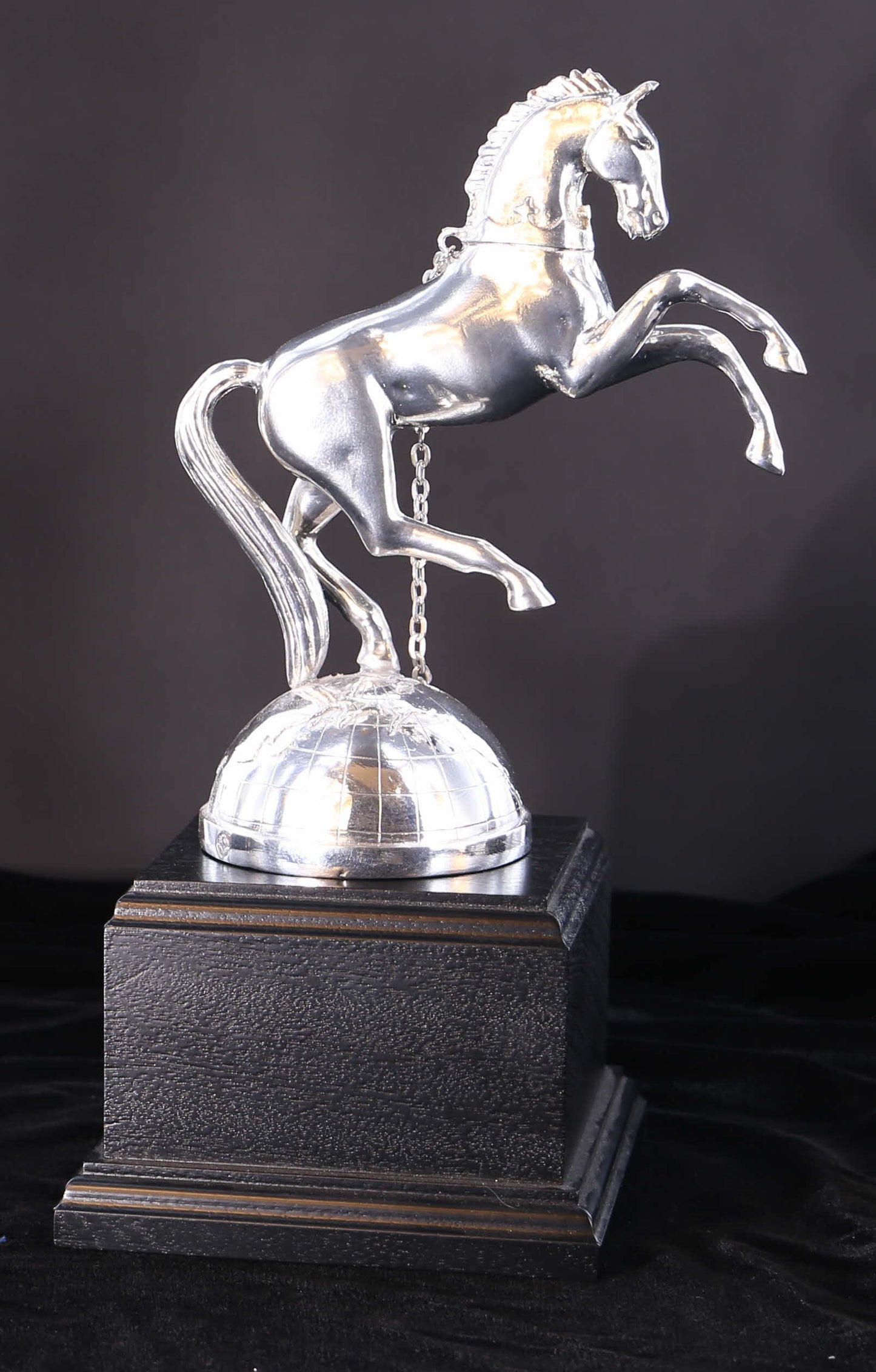 REME Rearing Horse in Polished Pewter on a Silver Globe